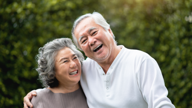 Senior Couple laughing in outdoor park